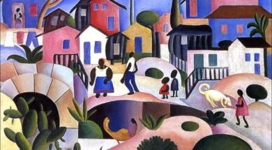 Pintura de paisagem com casas e algumas árvores ao fundo, com pessoas negras e um cachorro na parte da frente dessas construções, e morros com plantas no primeiro plano da pintura. São utilizadas diversas cores no quadro, bem como figuras geométricas para representar seus elementos. Autoria: Tarsila do Amaral.